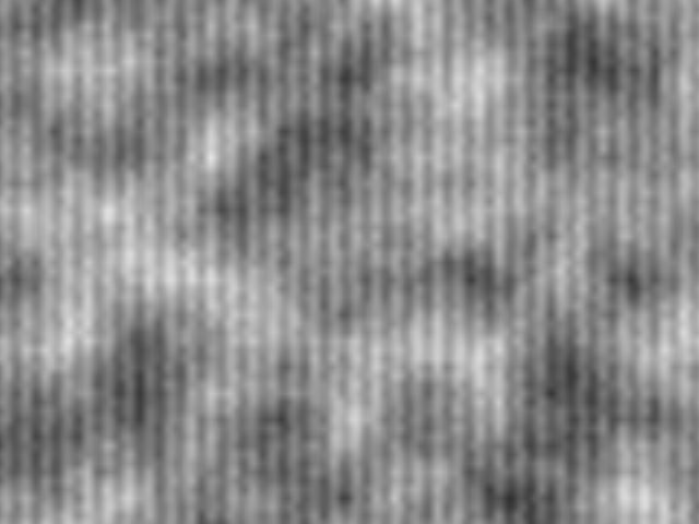 Surface texture brought out by raking light